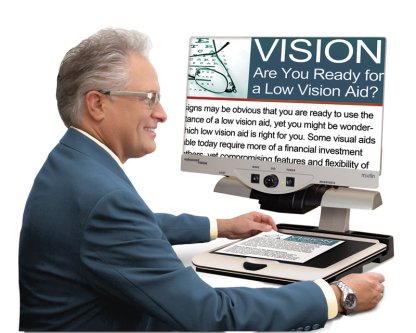 Desktop Electronic Magnifier--Merlin HD Ultra in use