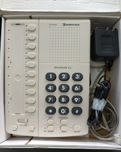white hands free speakerphone in the box
