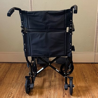 TRANSPORT WHEELCHAIR