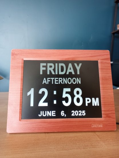 photo of calendar--wood frame, black background, white text
