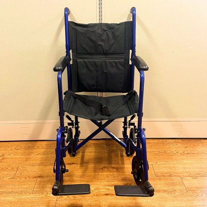 TRANSPORT WHEELCHAIR