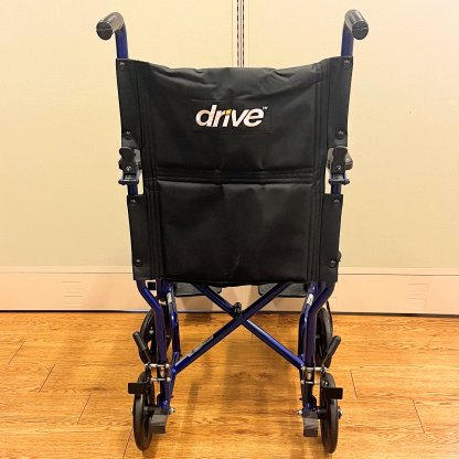 TRANSPORT WHEELCHAIR