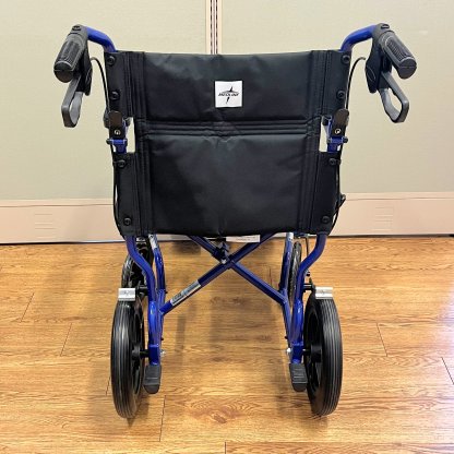 TRANSPORT WHEELCHAIR