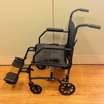 TRANSPORT WHEELCHAIR