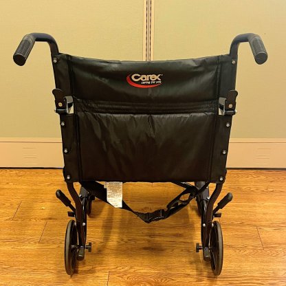 TRANSPORT WHEELCHAIR