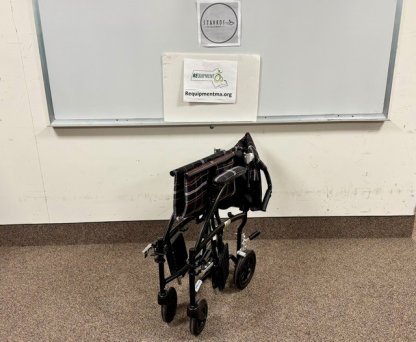 Fly-Lite Transport Chair folded up