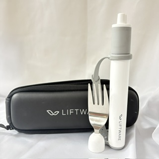 black case with white liftware level device and fork attachment