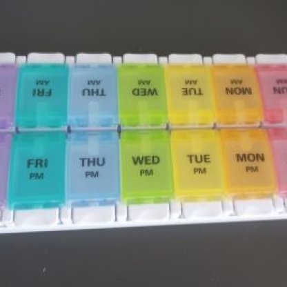 Rainbow-colored one-week pill dispenser