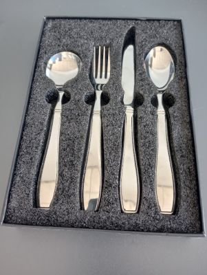 Silverware set with two spoons, a fork, and a knife