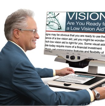 Desktop Electronic Magnifier--Merlin HD Ultra in use