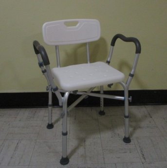 Shower chair with backrest and arms