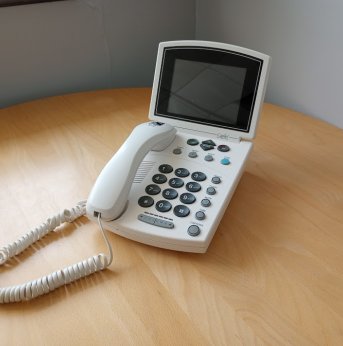 white big button caption phone