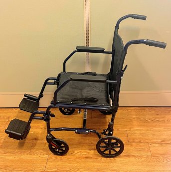 TRANSPORT WHEELCHAIR