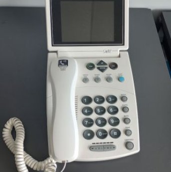 White big button corded phone with large screen