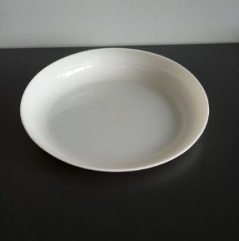 White plate with raised edges